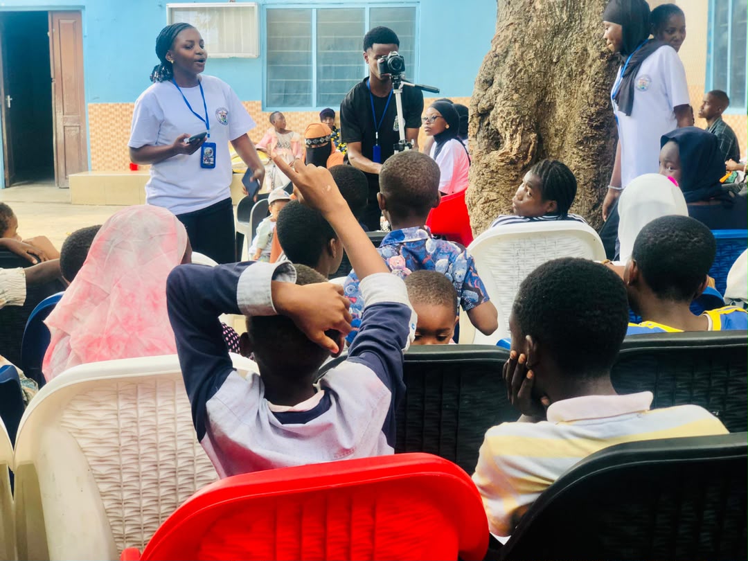Impact Crew facilitator leading a community learning session